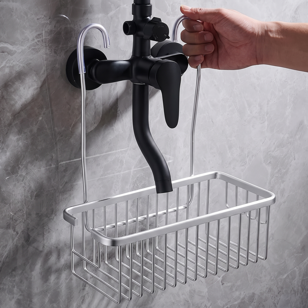 Pose du panier de douche : les crochets se posent sur le mitigeur, sans perçage